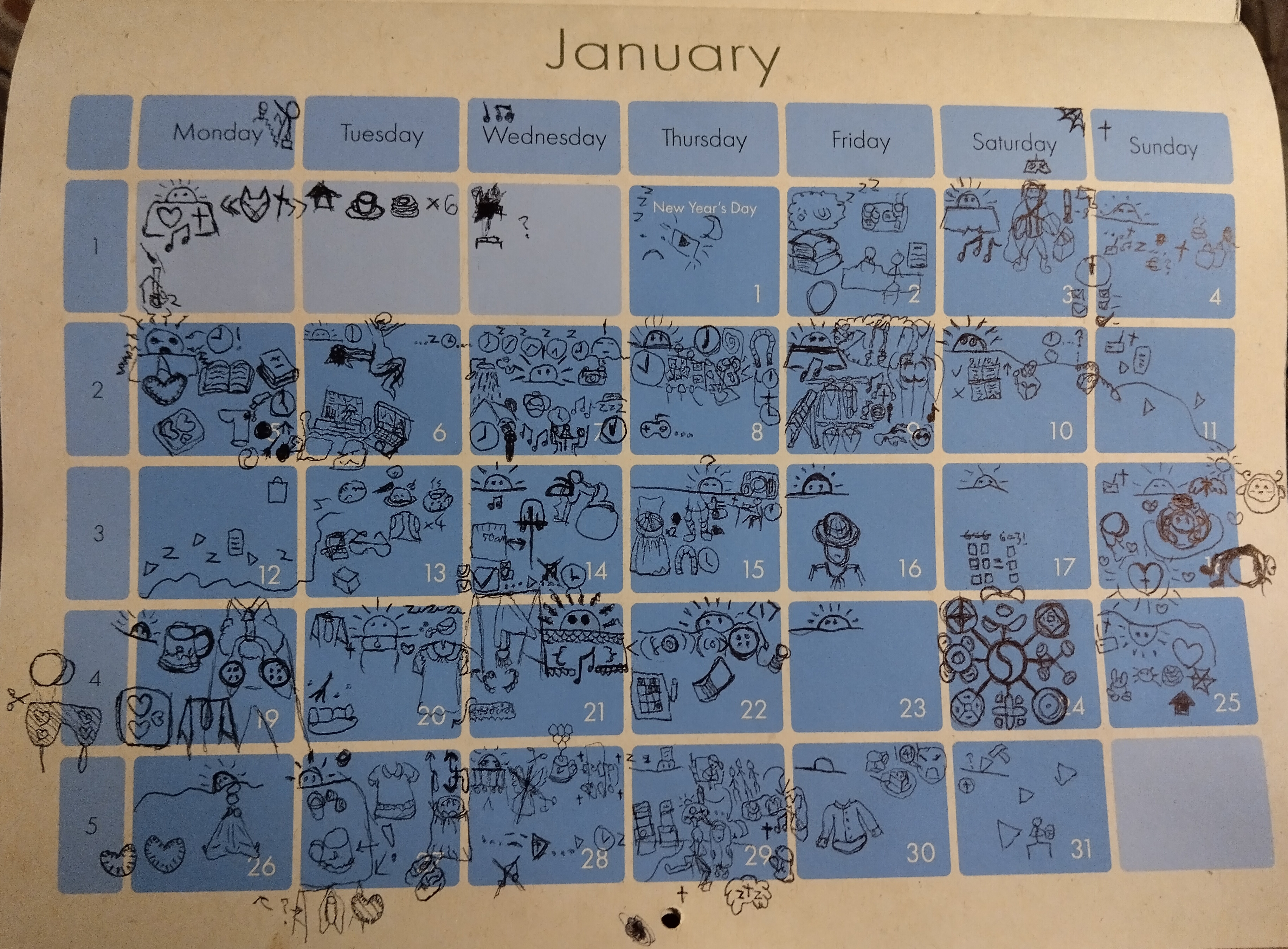 Calendar for month of January with each day having a simple drawings on it