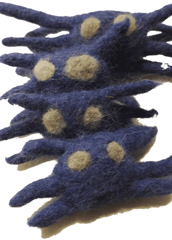 Bunch of small purple felt plushie spiders.