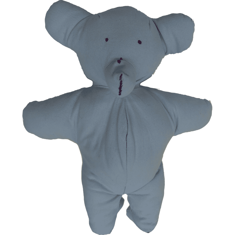 Teddybear made out of light blue cotton sheet fabric.